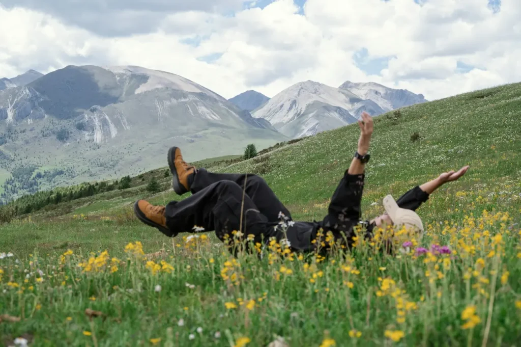 A Woman Relaxing in the Beautiful Flowery Mountain 